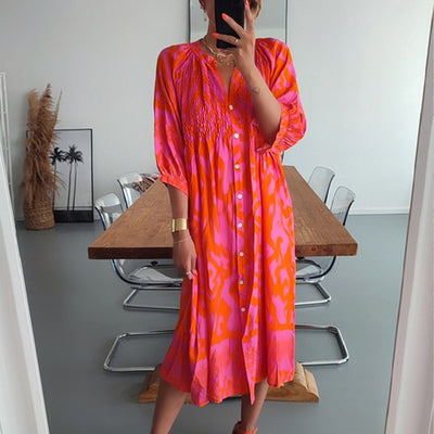 Midi-kjoler med knapper foran i farverne varm pink og orange