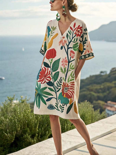 Mini kjole med blomsterprint og v-hals