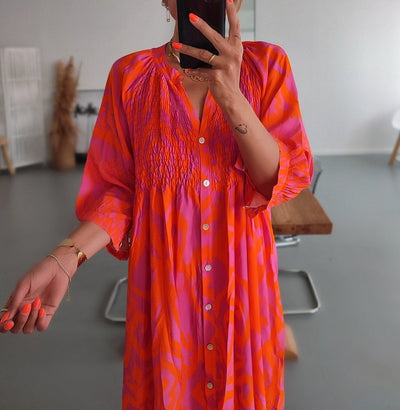 Midi-kjoler med knapper foran i farverne varm pink og orange