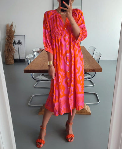 Midi-kjoler med knapper foran i farverne varm pink og orange