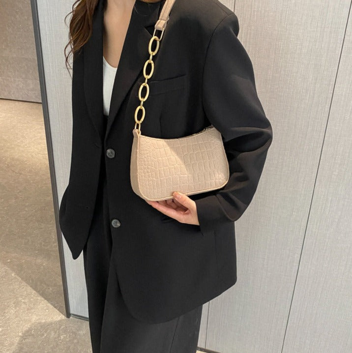 Magnella | Elegant skuldertaske i krokopregnet design