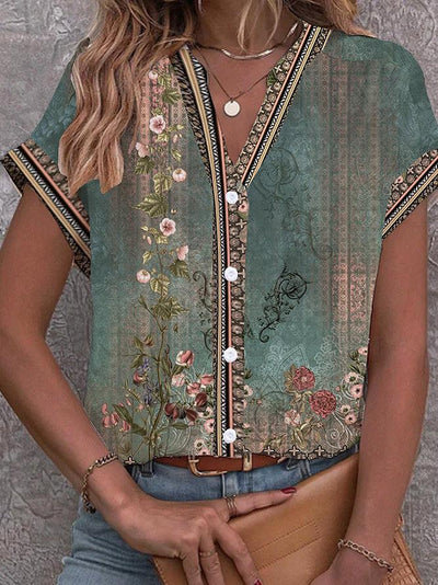 Bluse med blomsterprint i vandfarve i grøn