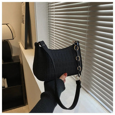 Magnella | Elegant skuldertaske i krokopregnet design